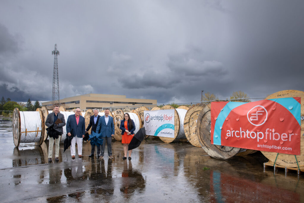 Lenny Higgins, President and COO, Shawn Beqaj, Chief Development Officer, Jeff DeMond, Chairman and CEO, Congressman Marc Molinaro, and Diane Quennoz, Chief Customer Officer, in front of Archtop Fiber’s fiber reels at our materials storage yard on May 3.